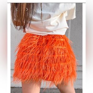 QUEEN OF SPARKLES Orange Feathered Midi Skirt
